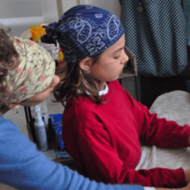 Beth Barbeau and son at mother's deathbed